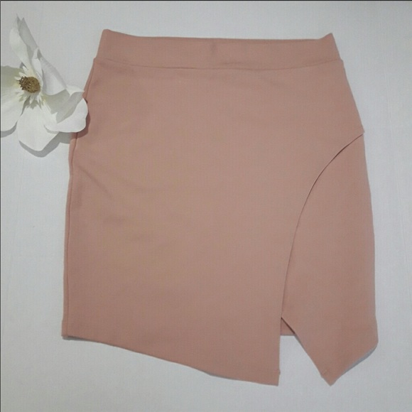 Forever 21 Dresses & Skirts - Blush mini skirt with asymmetrical split.